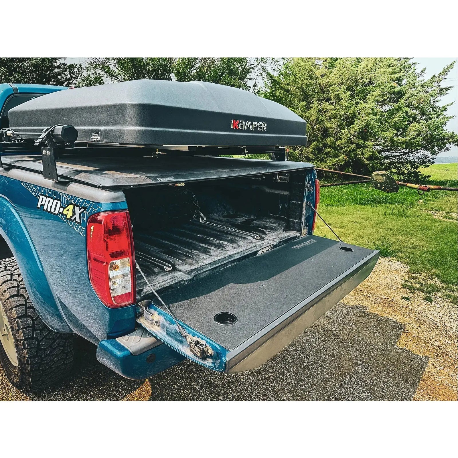 Nissan Frontier tailgate inserts by generation.